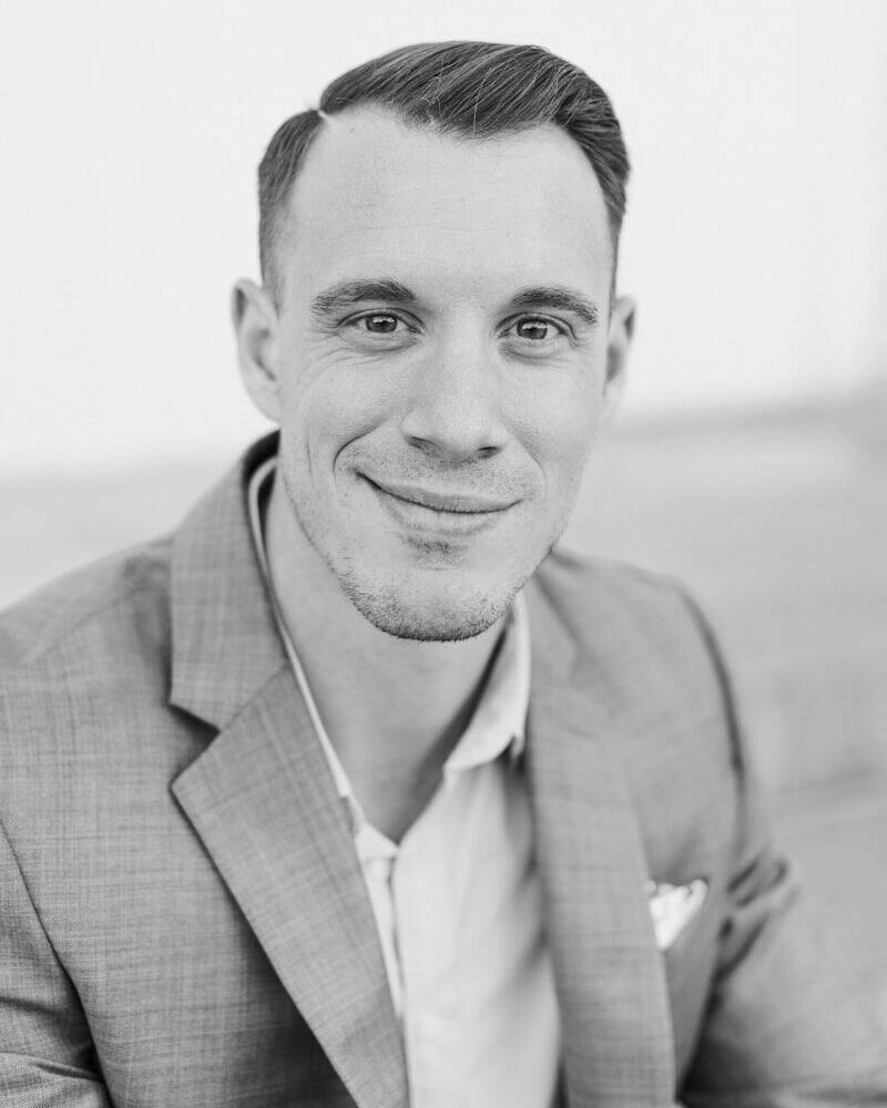 man in gray suit jacket